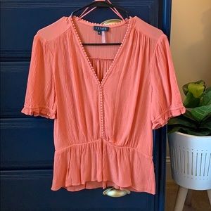 1. State circle trim peplum top